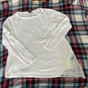 White sweater with slanted bottom and lace panel